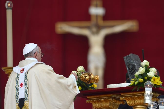 Pope Francis blesses the remains of St Peter during a ceremony of Solemnity of Our Lord Jesus Christ the King at St Peter's square on November 24, 2013 at the Vatican.